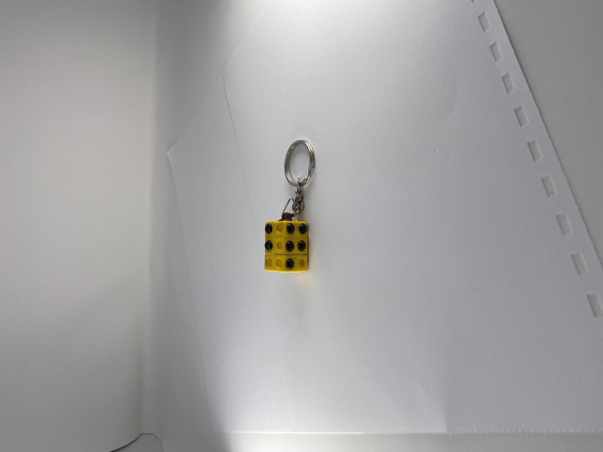 Picture picture of our Braille Letter Keychain